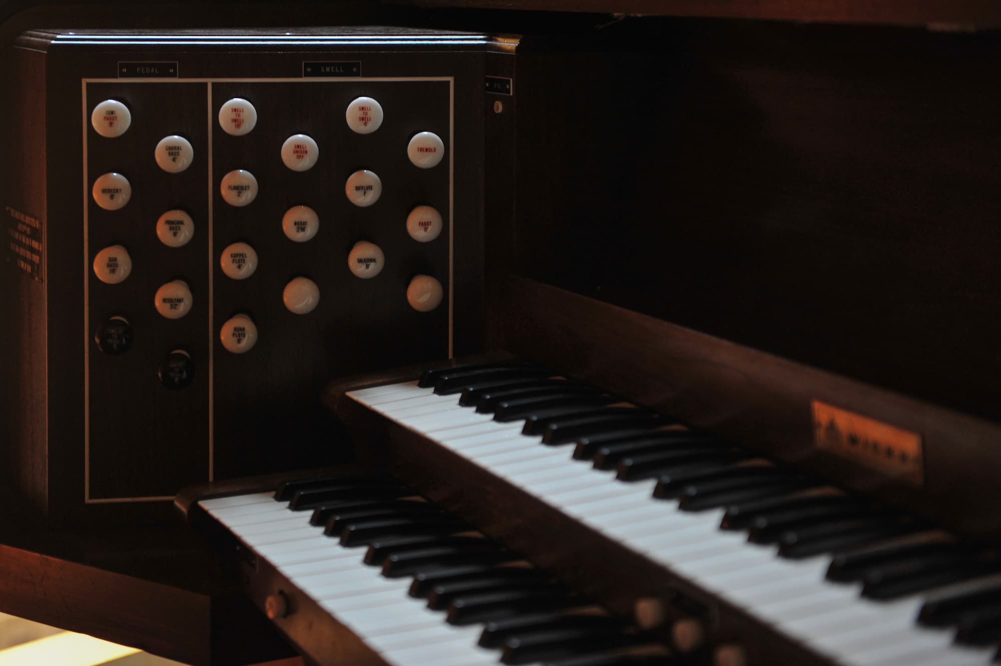 Detailed view of the ten-rank Wicks pipe organ console at Trinity Lutheran Church, Richmond, BC.